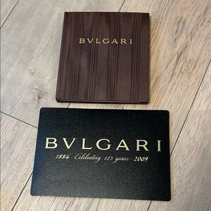 Bvlgari mouse pad and small table book